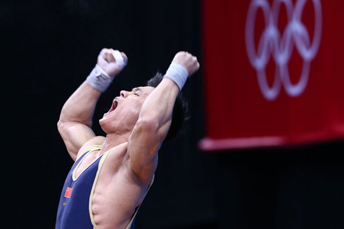 JO-2012/halt&eacute;rophilie en -77 kg: m&eacute;daille d'or et record du monde pour le Chinois Lu Xiaojun