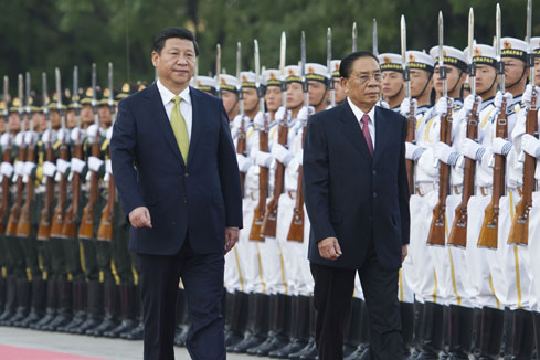 Xi Jinping rencontre le pr&eacute;sident laotien