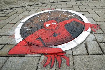 Photos: graffitis sur les plaques d'&eacute;gout &agrave; Changsha